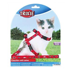 Trixie Kätzchen-Garnitur mit Katzenmotiv eignet sich für Kätzchen und kleine Katzen. Es besteht aus stabilem Nylon und ist stufenlos verstellbar.